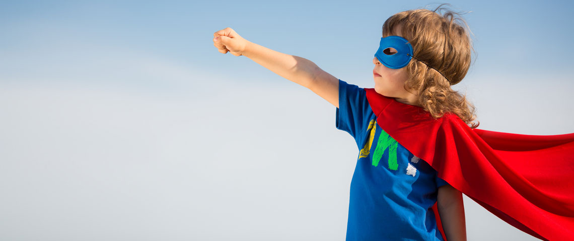 Child dressed up in a superhero outfit