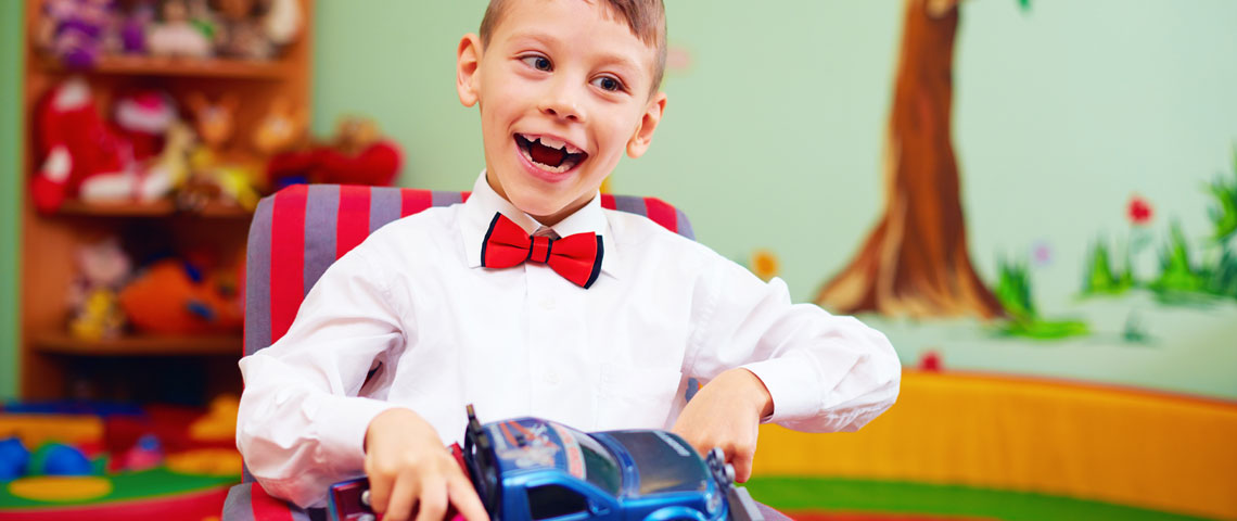 Child holding a toy car
