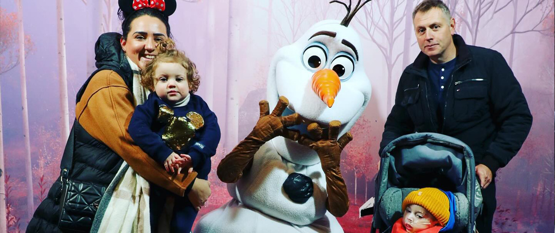 Dougie and his family at Disneyland Paris