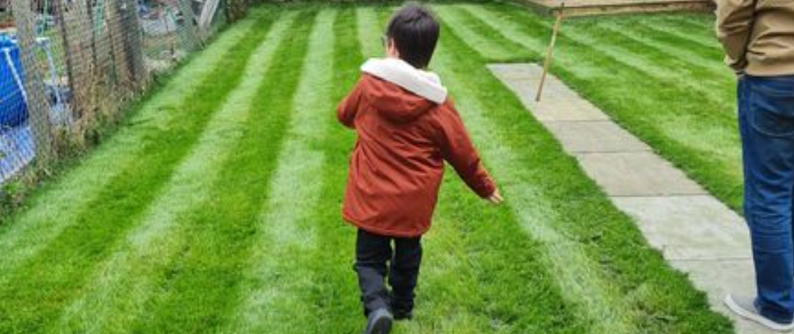 Mason running in his new garden