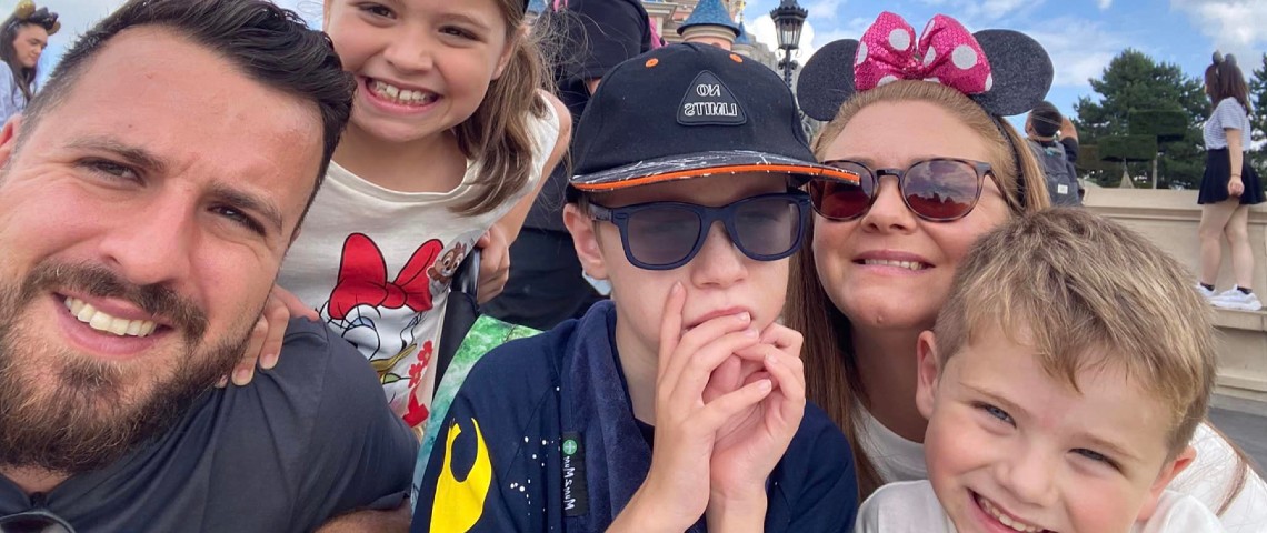 Riley and family at Disneyland Paris